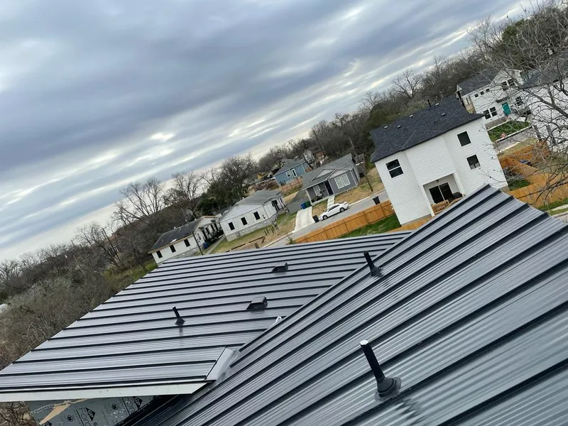 Standing seam metal roof panels with vents for Skylight Repair in Cottonwood Heights